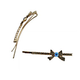 BROCHE DORADO CON PIEDRAS $20